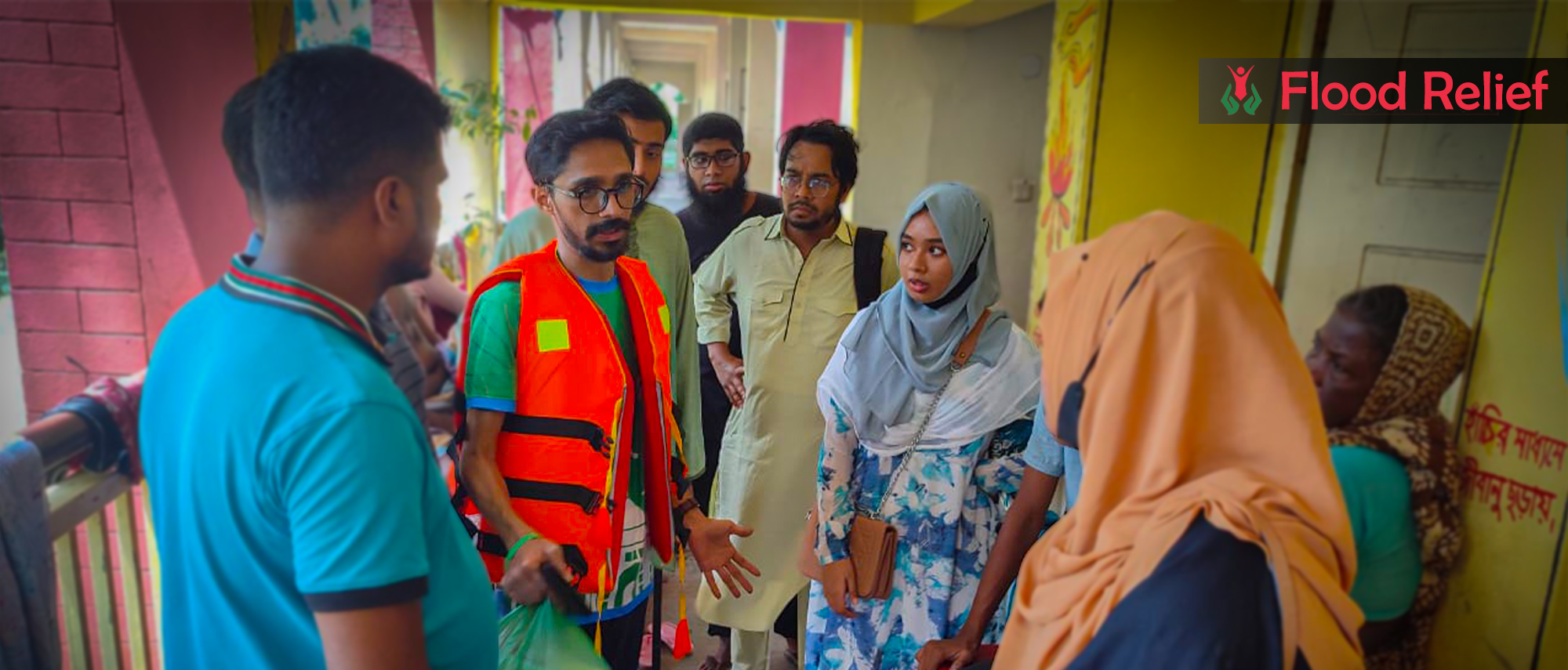 Standing beside displaced families